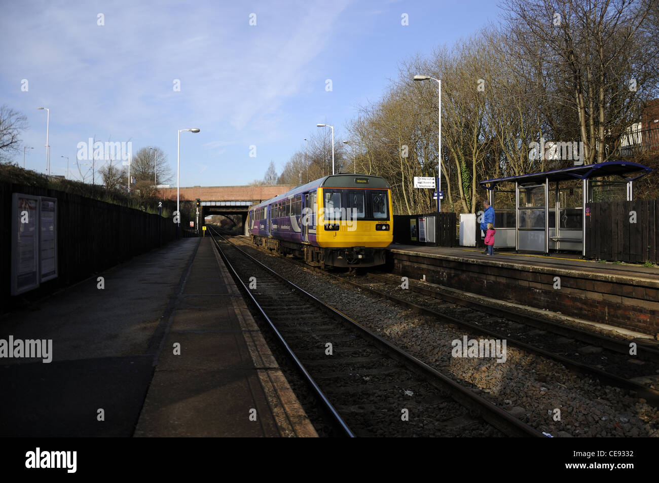 Northern Rail two car passenger train stopping at station for ...