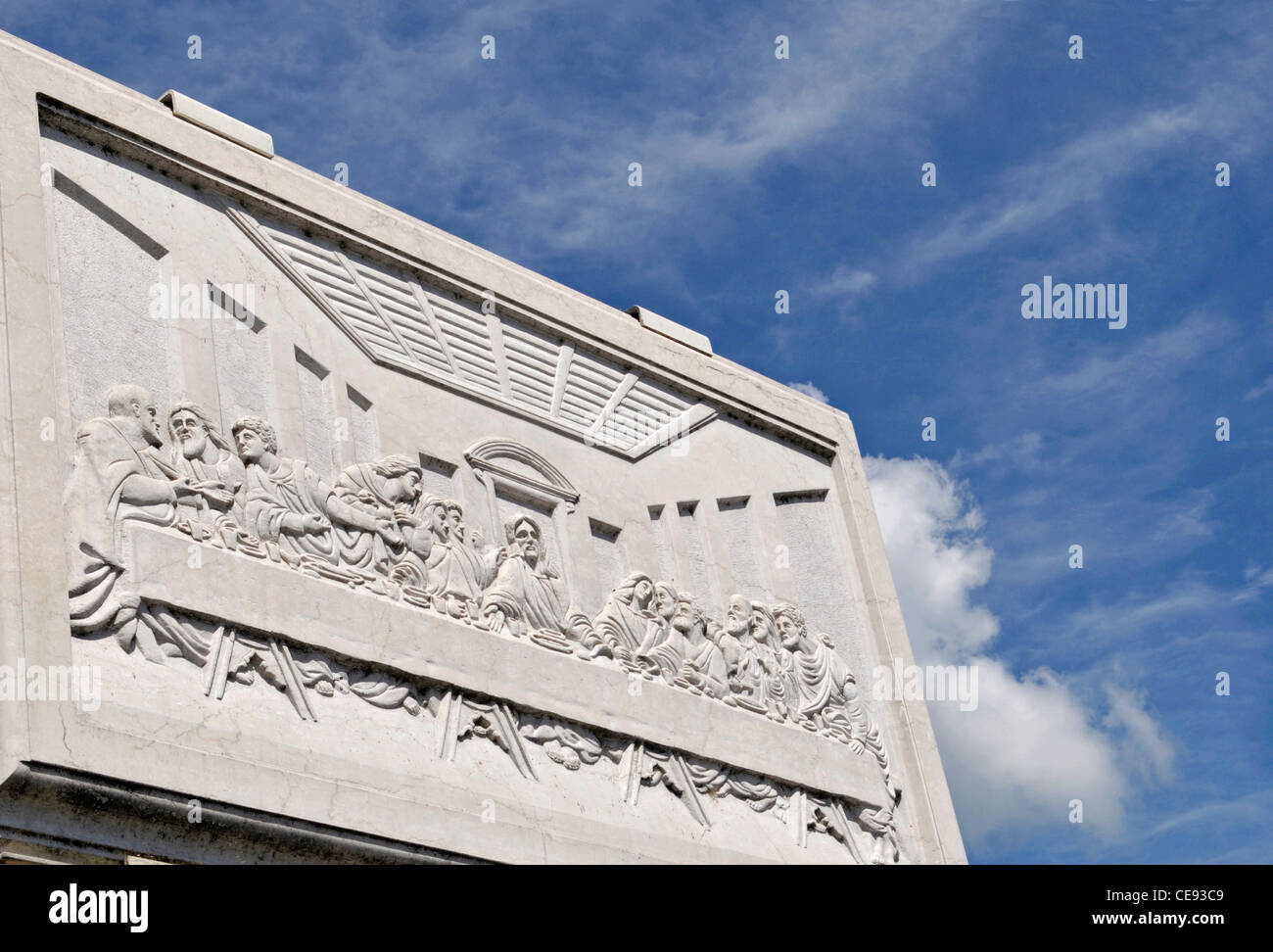 Marble Carving BasRelief depicting The Last Supper against blue sky