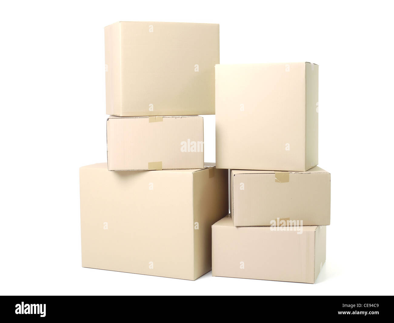 Pile of cardboard parcels shot on white background Stock Photo