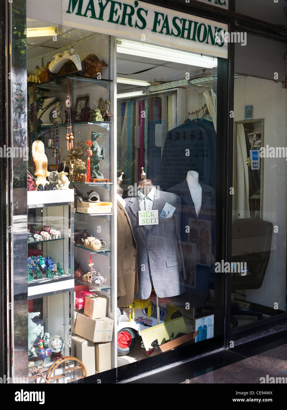 dh Kowloon Chinese tailors TSIM SHA TSUI EAST HONG KONG Chinese shop window silk suits display clothes suit displays tailor Stock Photo