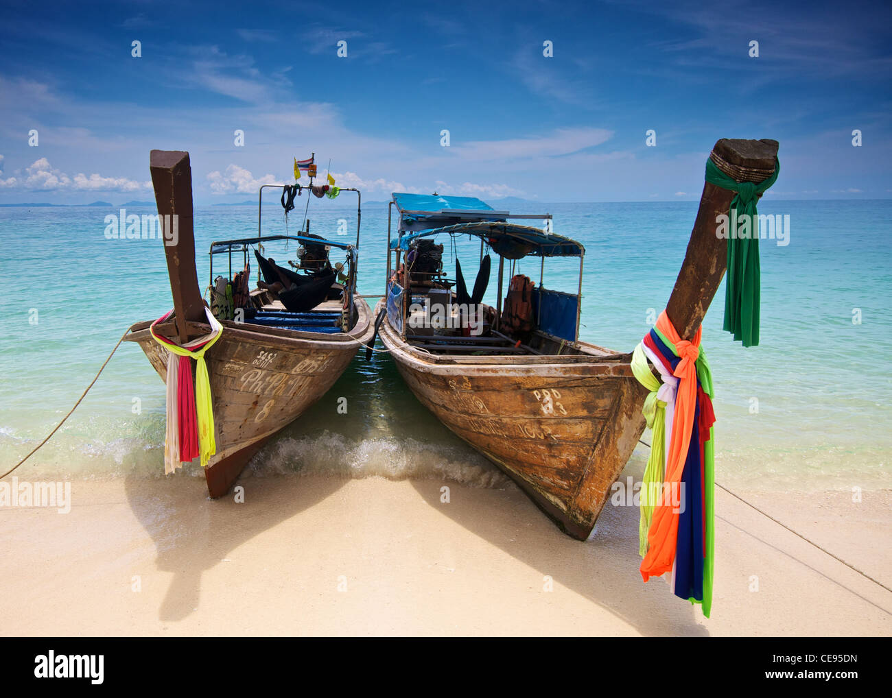 Thai long-tail boats on a beach Stock Photo