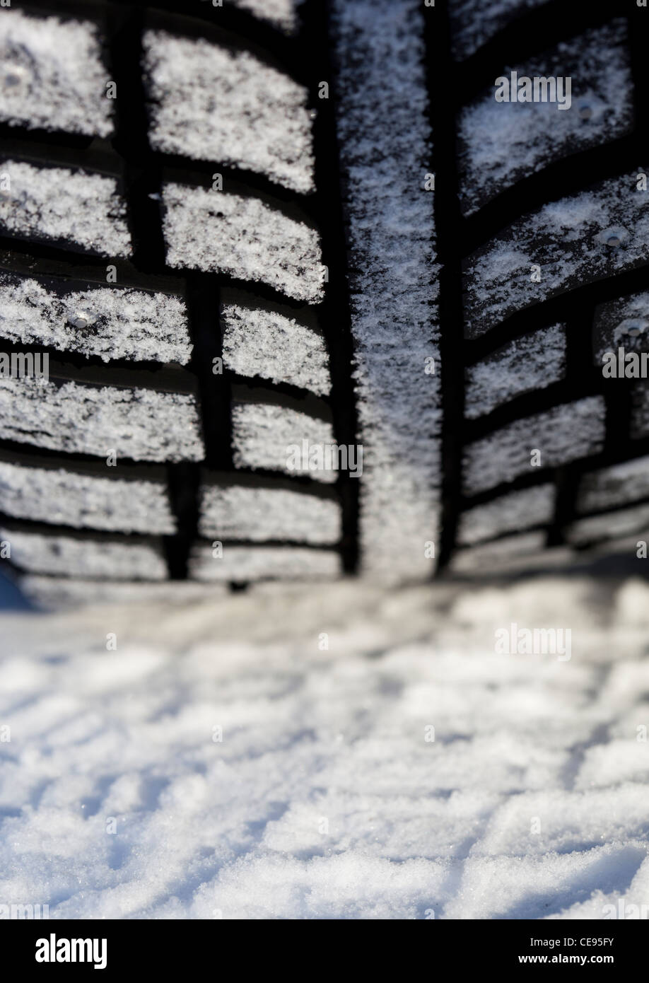 Closeup of a studded car winter tire tread , Finland Stock Photo