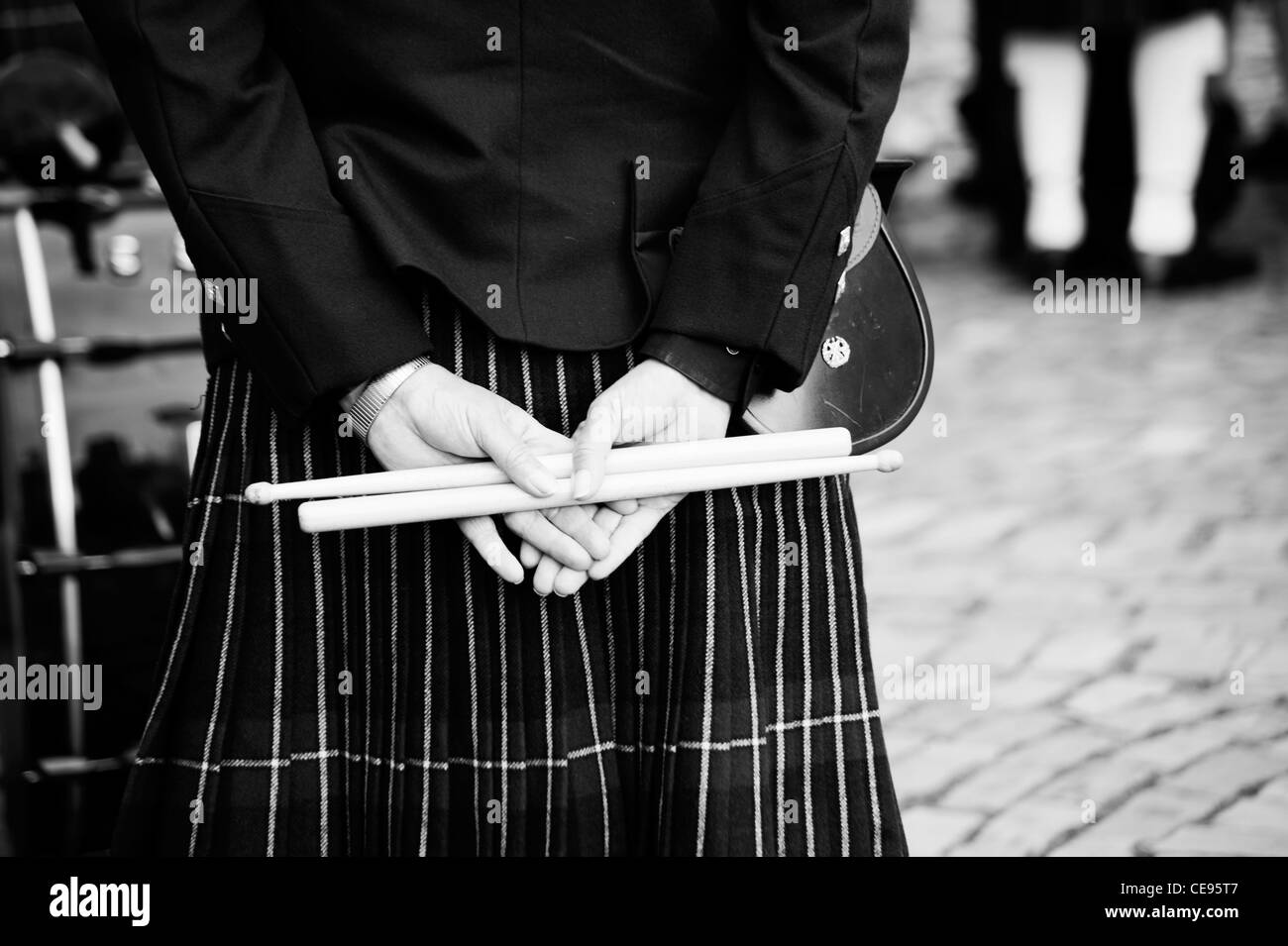 Scottish Army Drummer holds drumsticks behind his back on Remembrance Sunday. Stock Photo