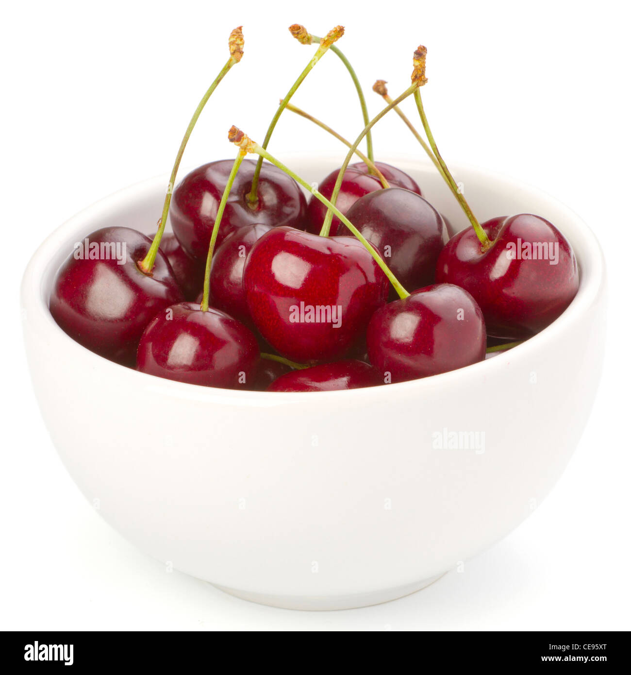 Red ripe cherries over white background Stock Photo - Alamy