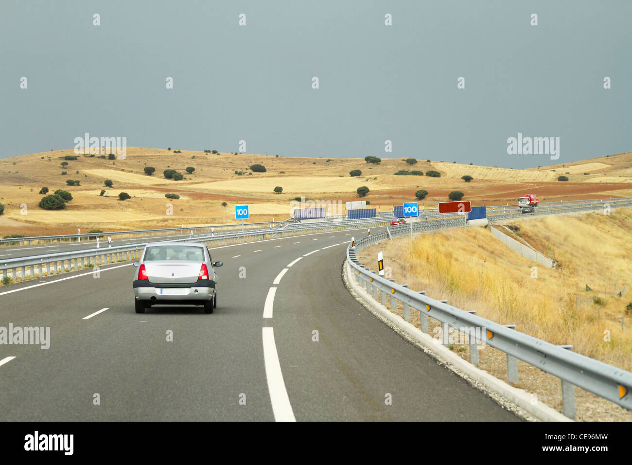 Road scene of several cars in Spain Stock Photo