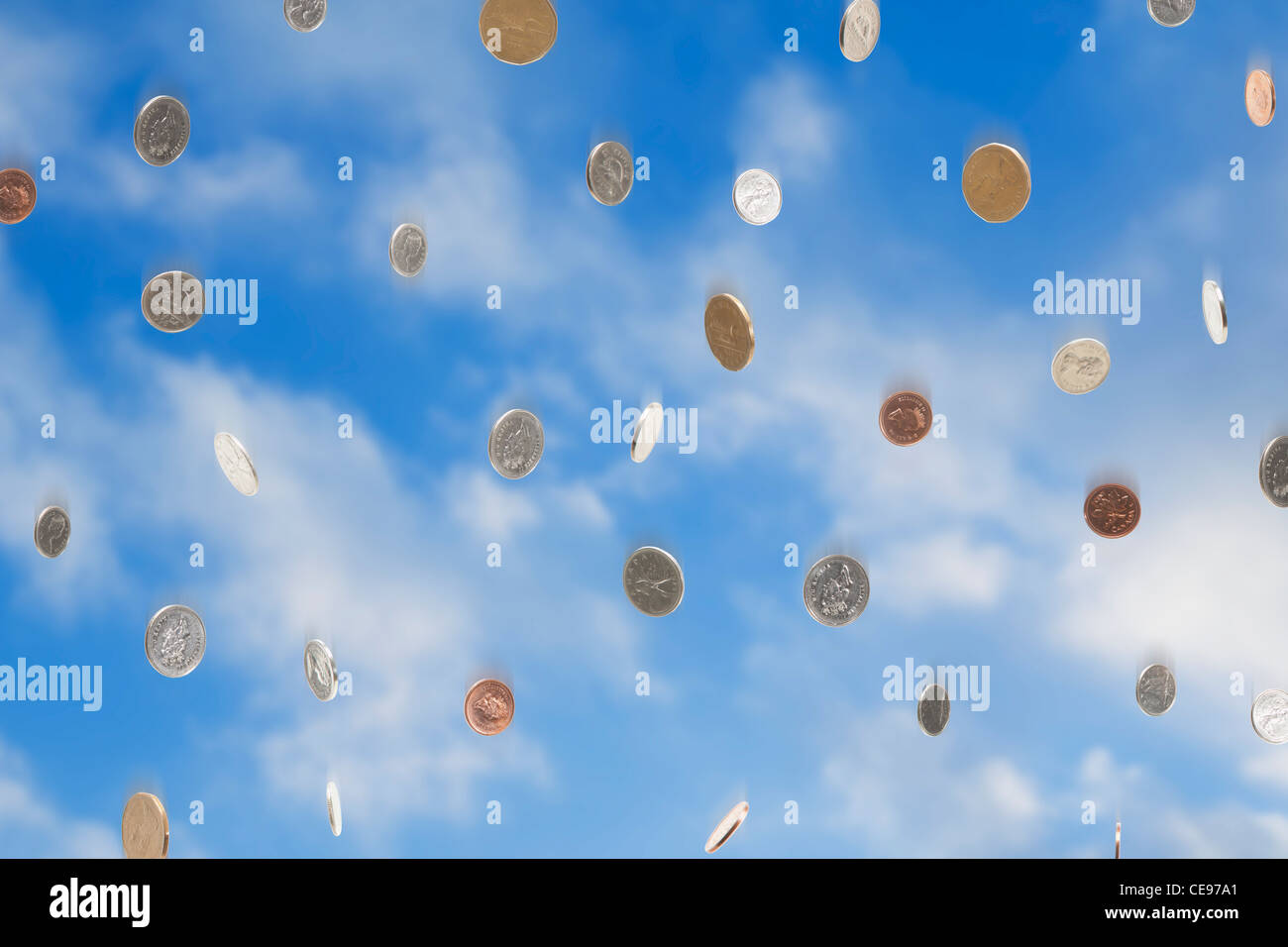 USA, Illinois, Metamora, Coins falling from sky Stock Photo