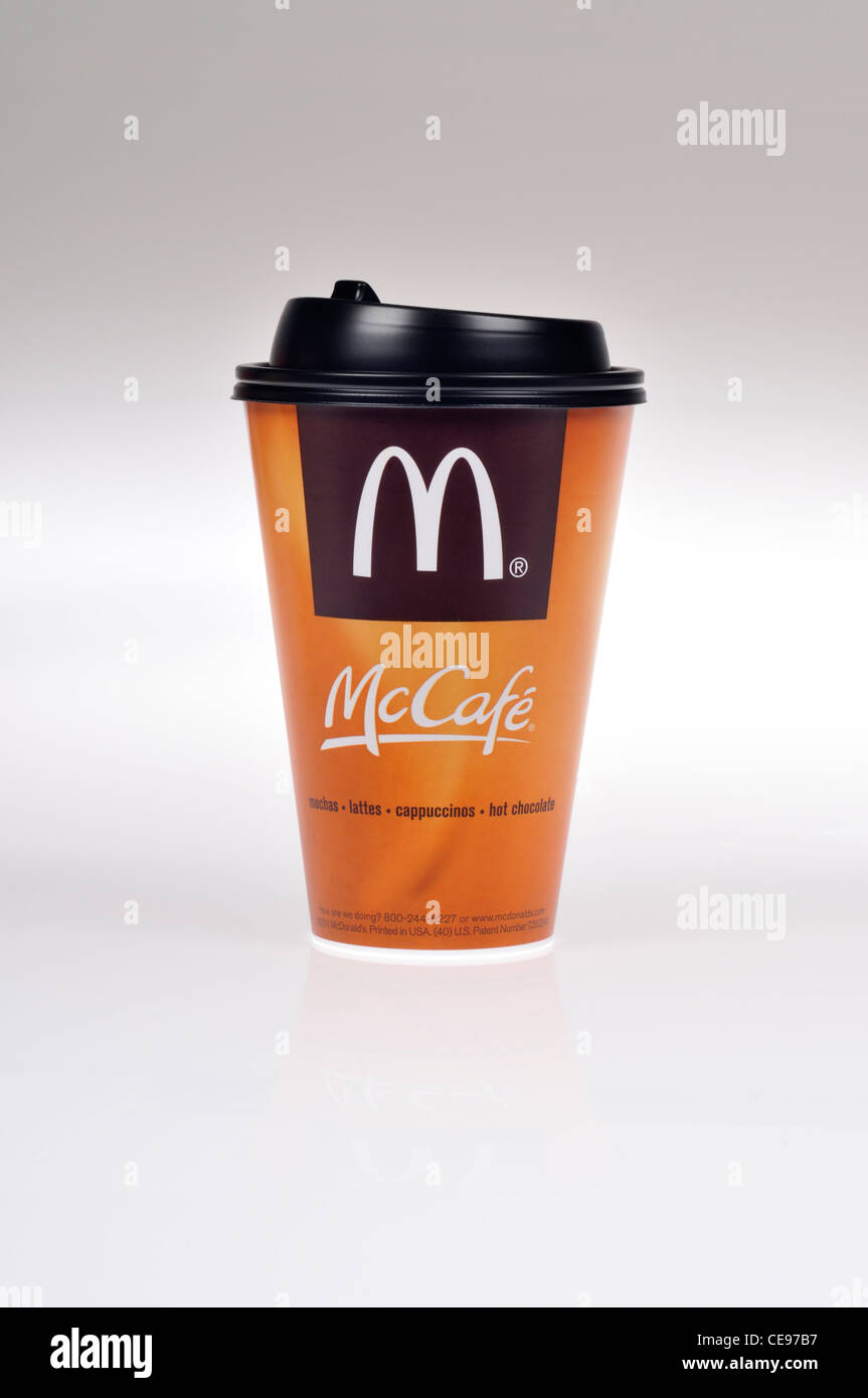 Cup of McDonalds McCafe hot coffee with cover on white background cutout Stock Photo
