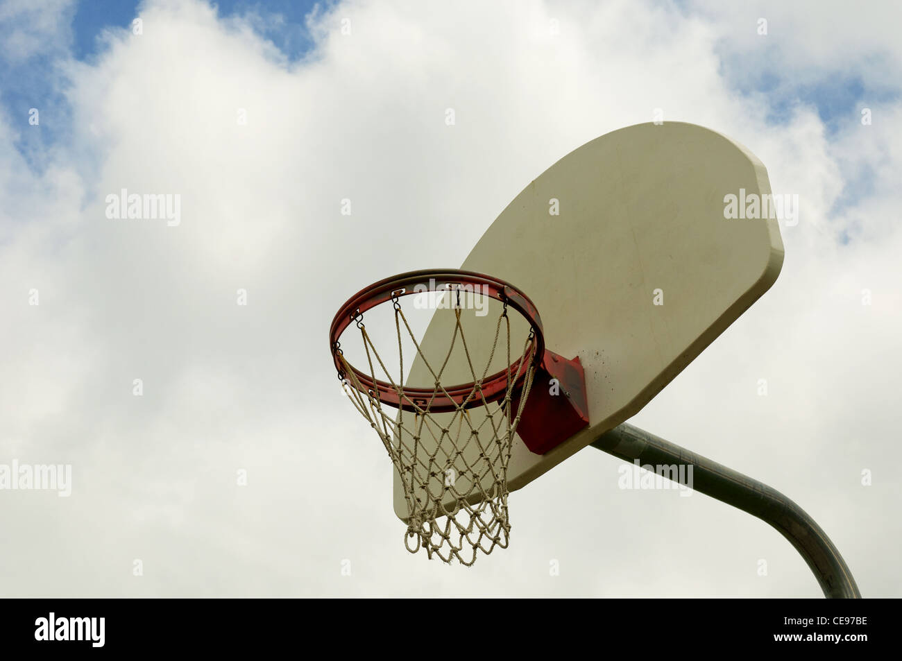 A Basket Ball Hoop on a Cloudy Background Stock Photo