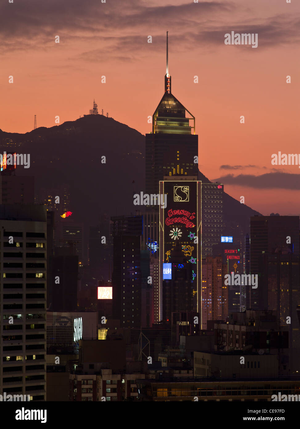 dh Central Plaza tower WAN CHAI HONG KONG night lights Victoria Peak sunset skyline dusk building Stock Photo