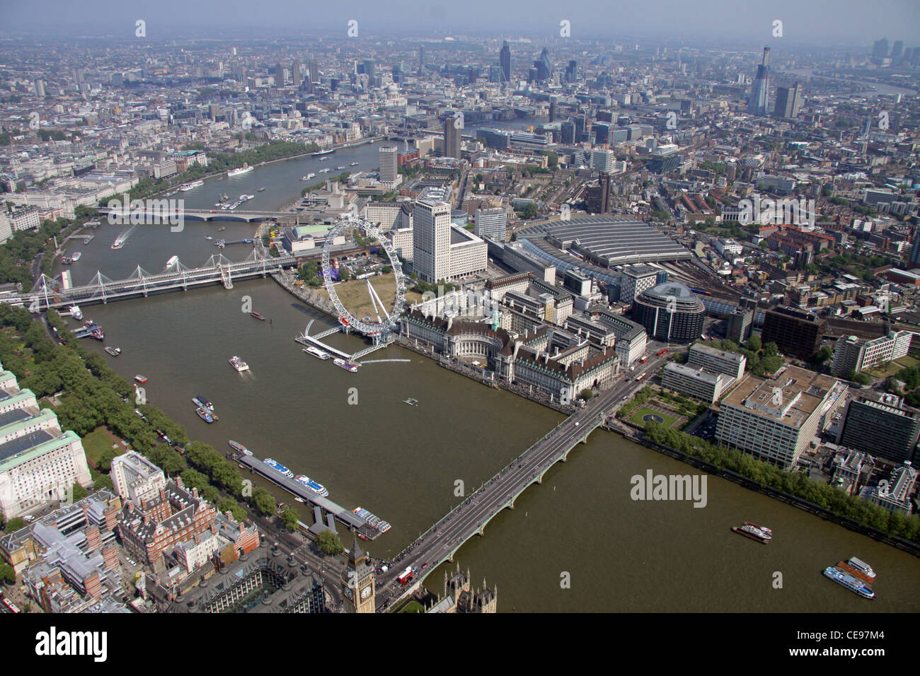 aerial view looking across Westminster Bridge and the River Thames towards the London Eye on the south bank in Lambeth, London SE11 Stock Photo