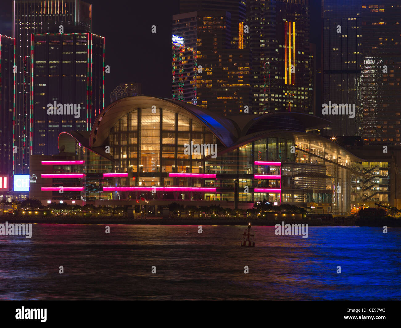 dh Convention Exhibition Centre WAN CHAI HONG KONG Harbour HKCEC building Wanchai waterfront night lights buildings center Stock Photo