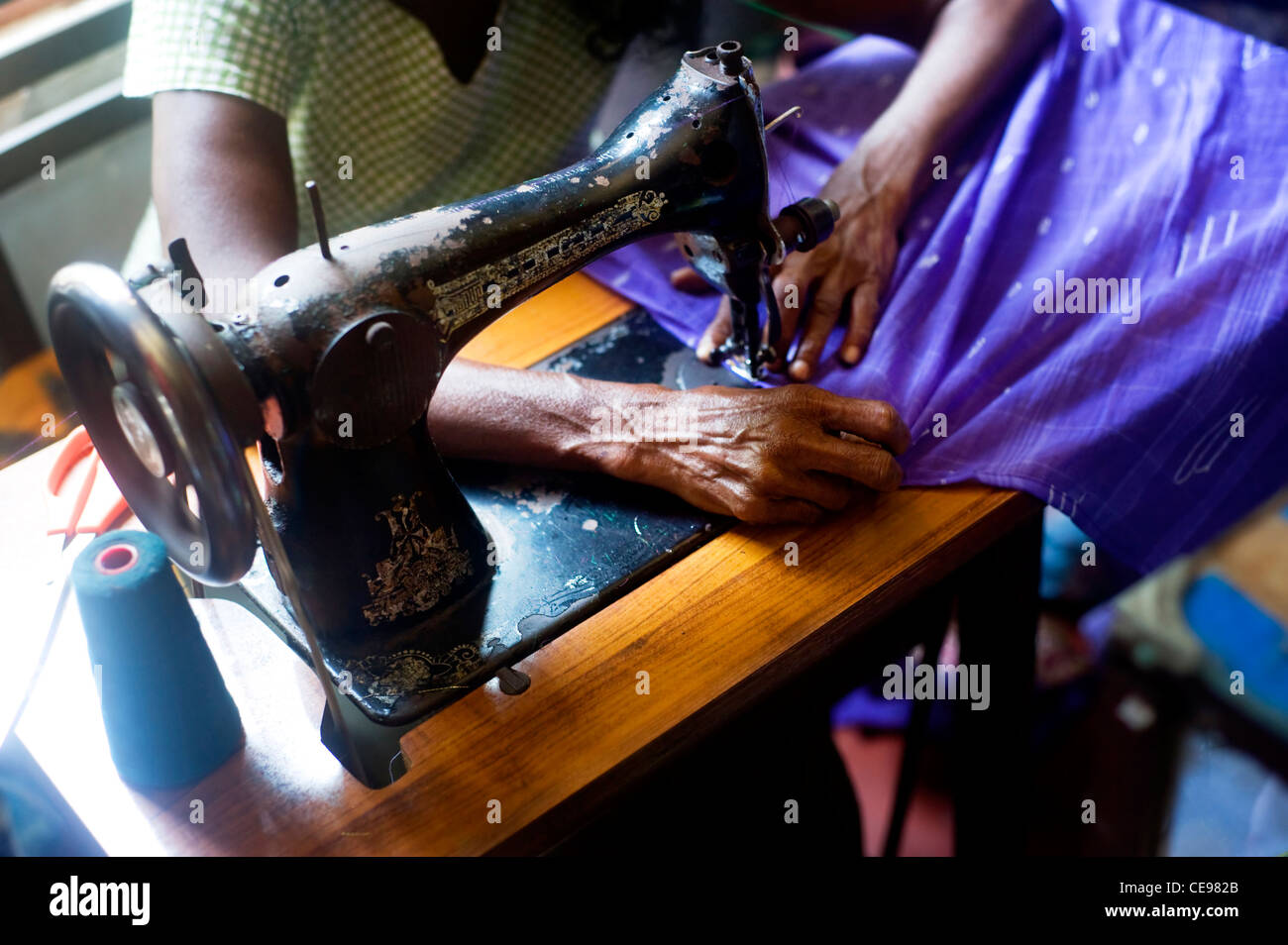 Sri Lankan tailor making new clothes Stock Photo