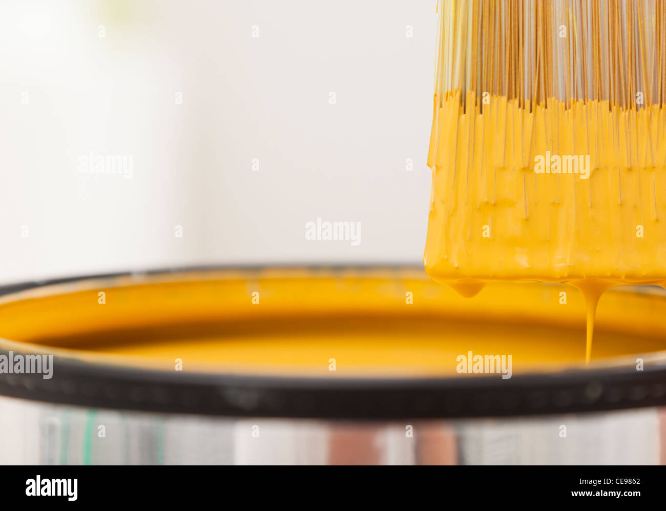 Studio shot of paint brush and paint can Stock Photo