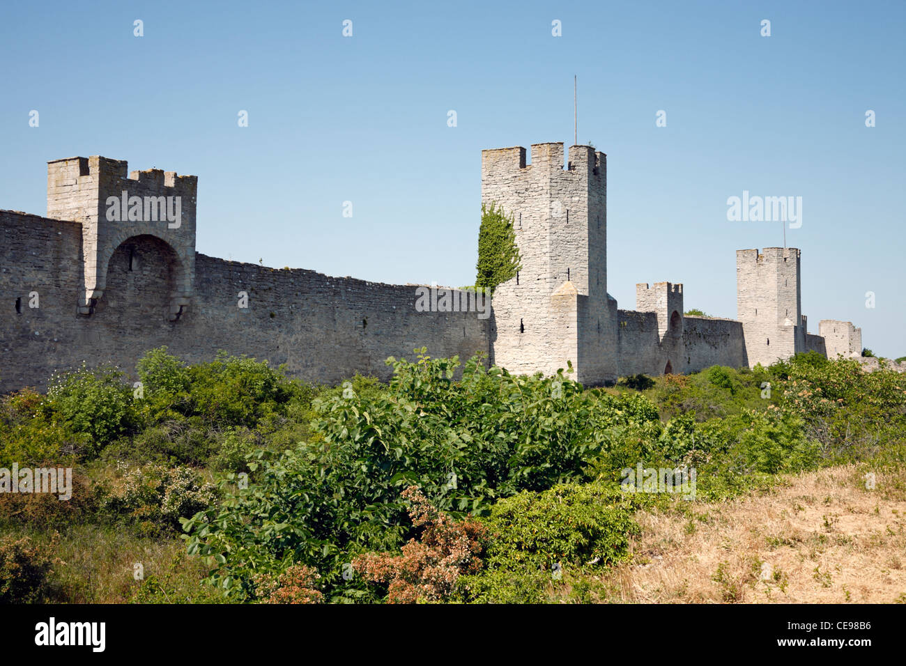 The city wall, the medieval city ring wall with towers around the medieval Hanseatic city Visby on the Swedish island Gotland in the Baltic Sea. Stock Photo