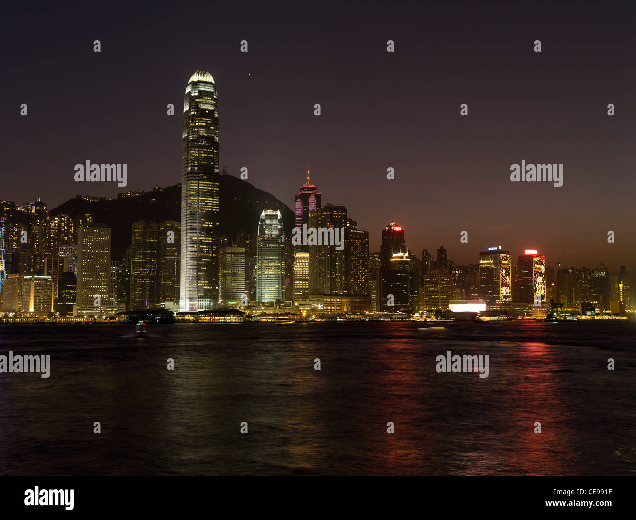 dh Central skyline VICTORIA HARBOUR HONG KONG Buildings waterfront night lights IFC2 sea sunset dusk city ifc 2 from harbor Stock Photo