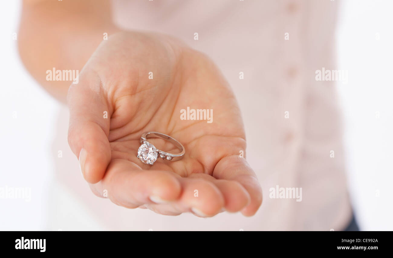 USA, Illinois, Metamora, Close-up of woman's hand holding engagement ring Stock Photo