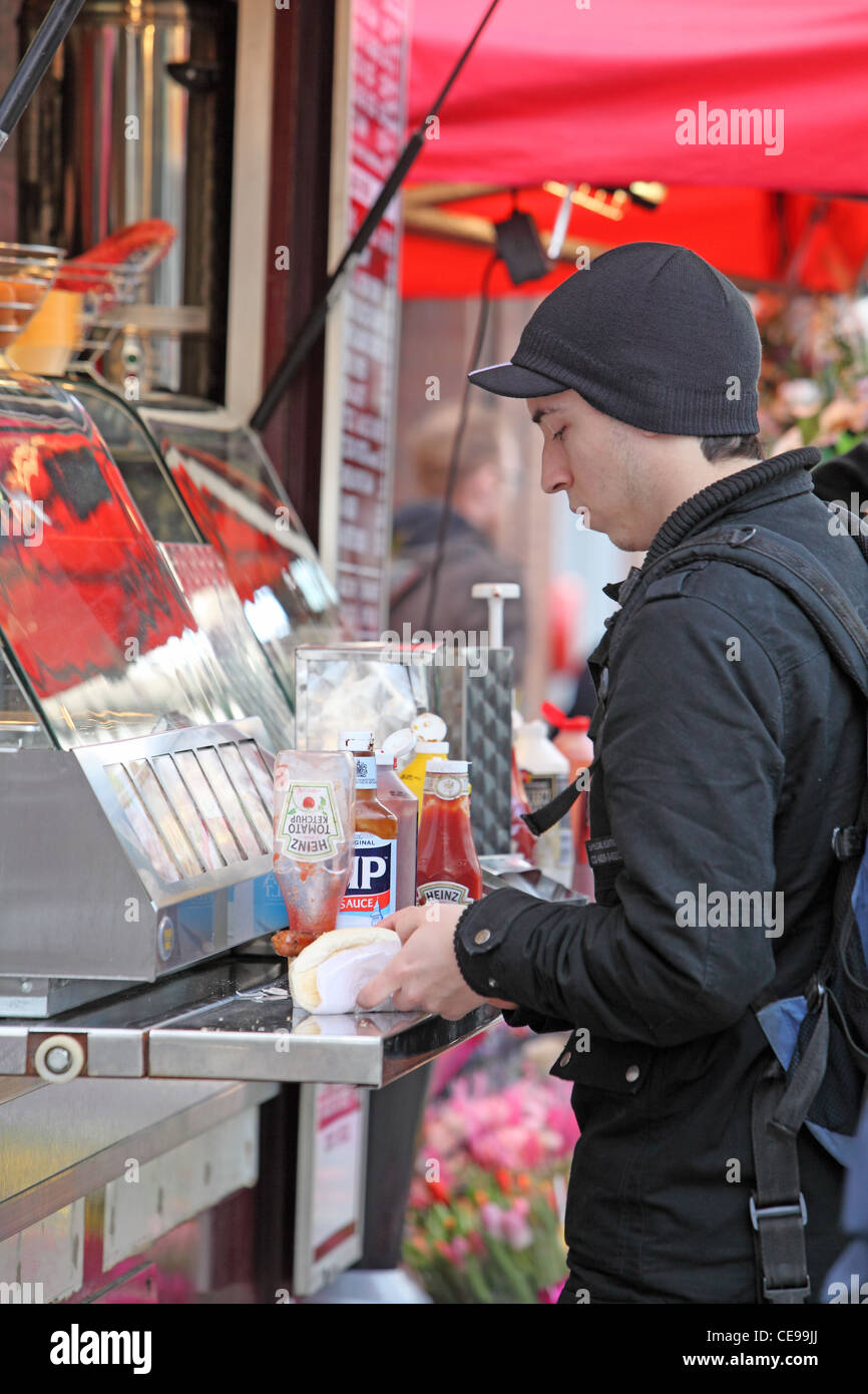 eating on the street Stock Photo