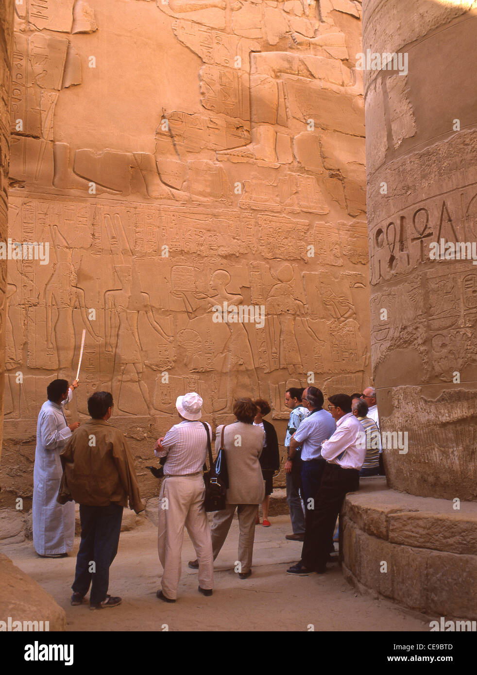 Local guide at Karnak Temple, Luxor, Luxor Governorate, Republic of Egypt Stock Photo