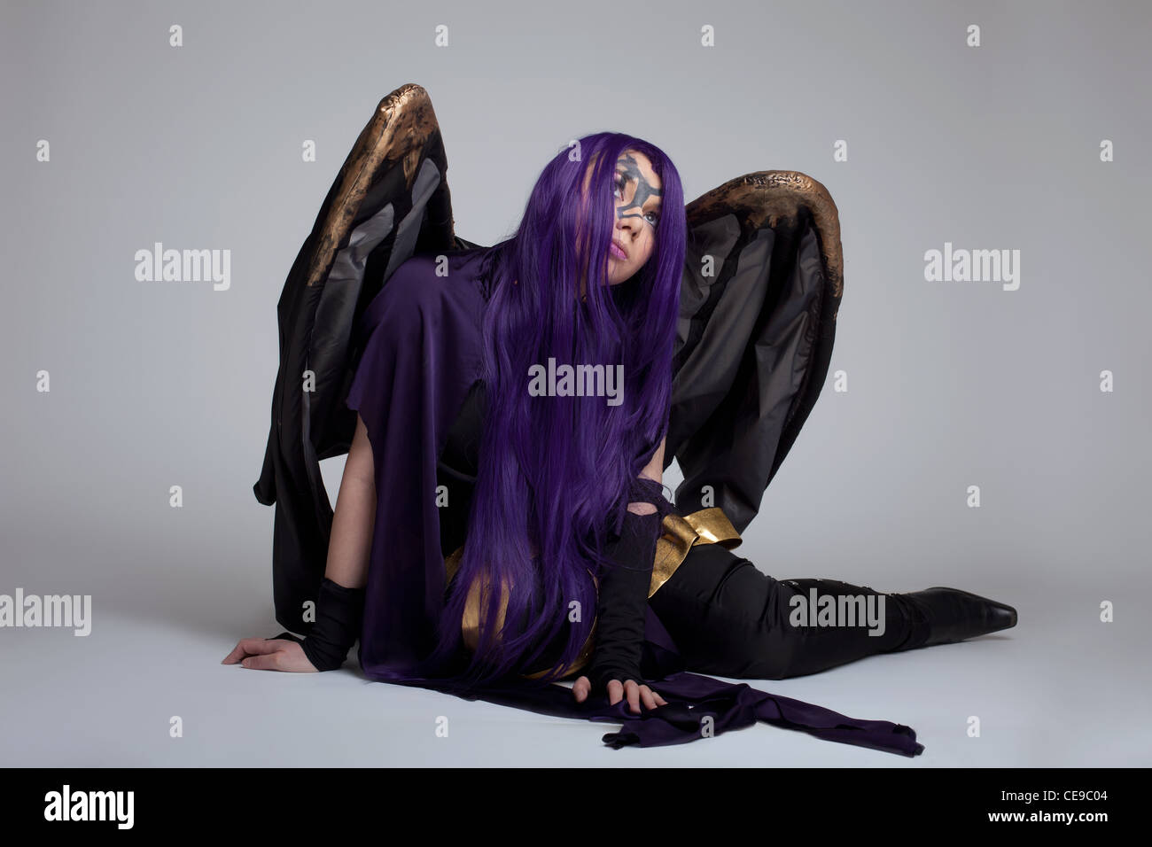 Girl In Purple Witch Cosplay Costume Anime Character Sit Portrait