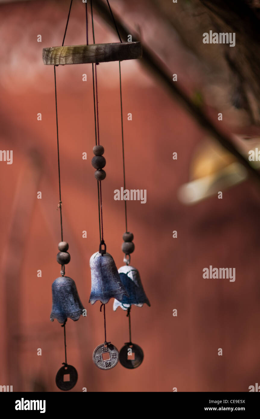 A wind chime with little prayer bells Stock Photo