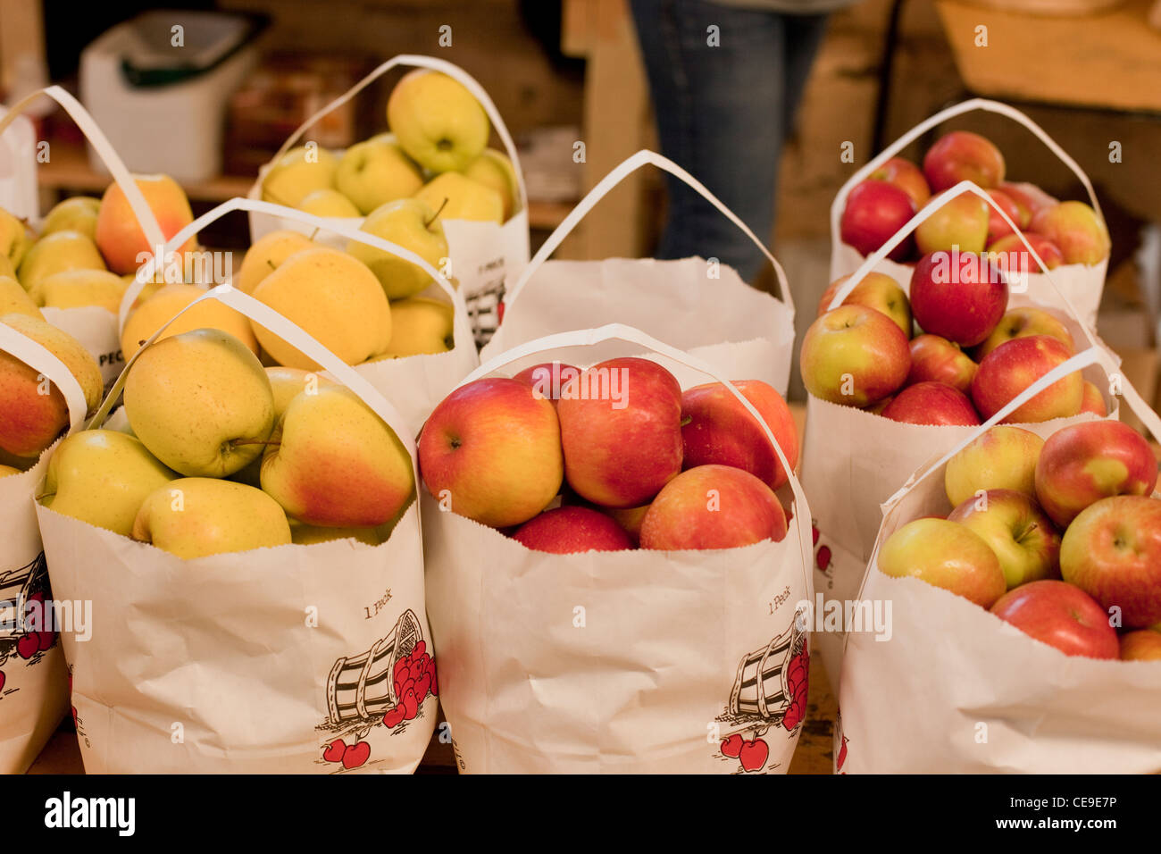 Farmers Market Ontario Canada with apples in paper bags on display