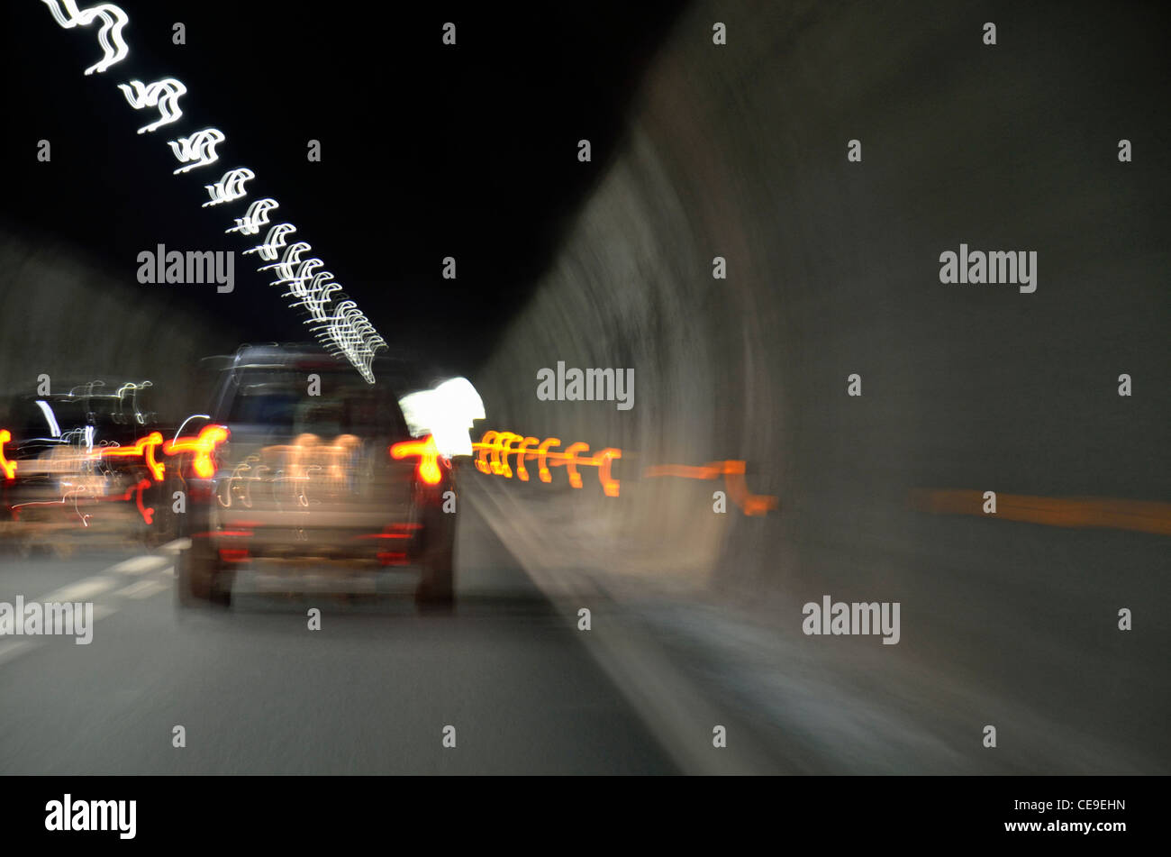 Speeding car inside a highway tunnel, Italy (blurred motion) Stock Photo