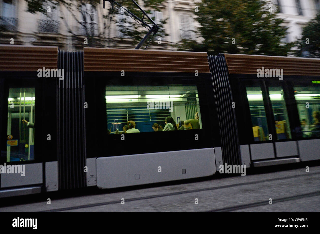 Tramway train on Longchamps avenue at dawn, Marseille, France (blurred motion) Stock Photo