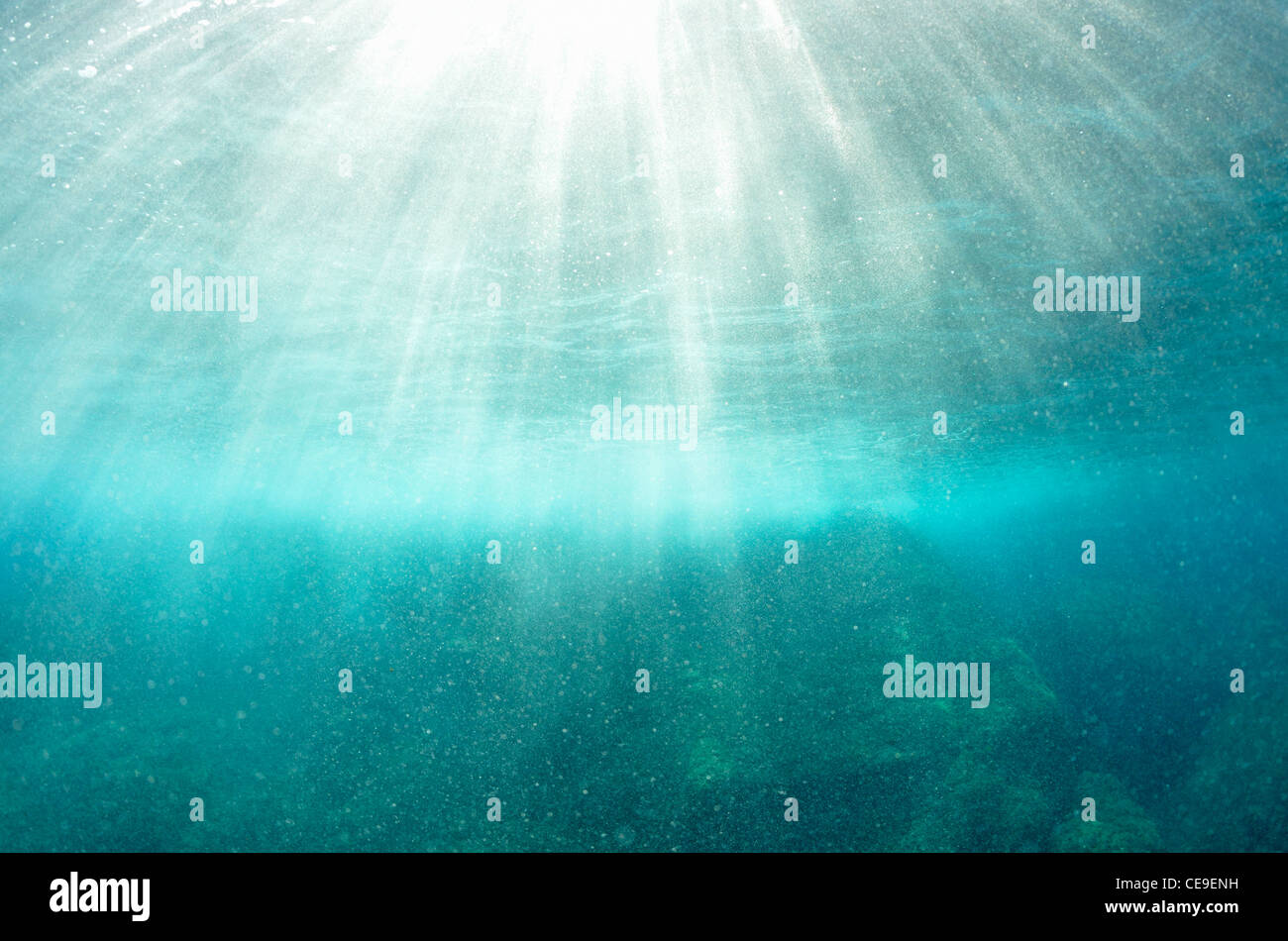 Sunrays penetrating water's surface, Port-Cros island, France (underwater view) Stock Photo