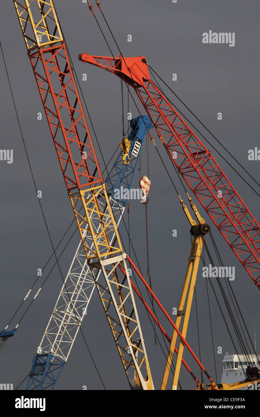 Multi-coloured Crane Jibs Stock Photo