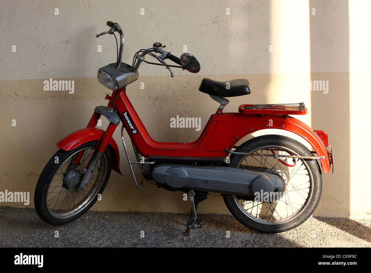 Red scooter Piaggio Boxer 2 Mofa in the rays of spring sunshine Stock Photo  - Alamy