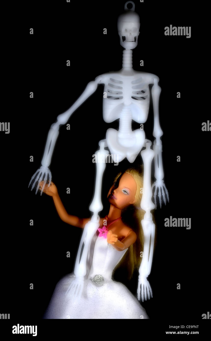 Barbie doll with skeleton ghost Stock Photo