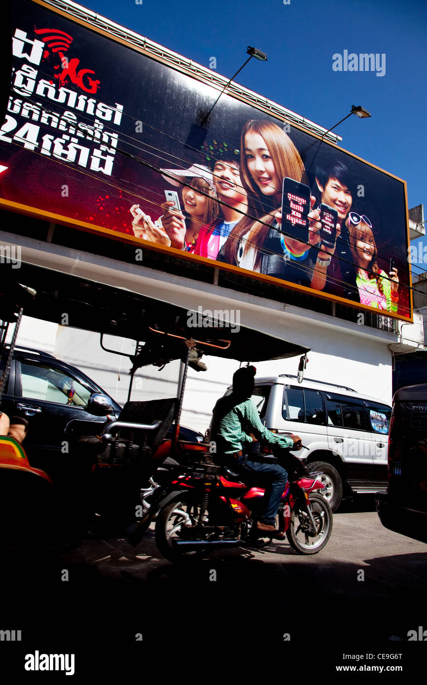 Billboard advertising wireless technology and smart phones, Phnom Penh, Cambodia, Asia Stock Photo