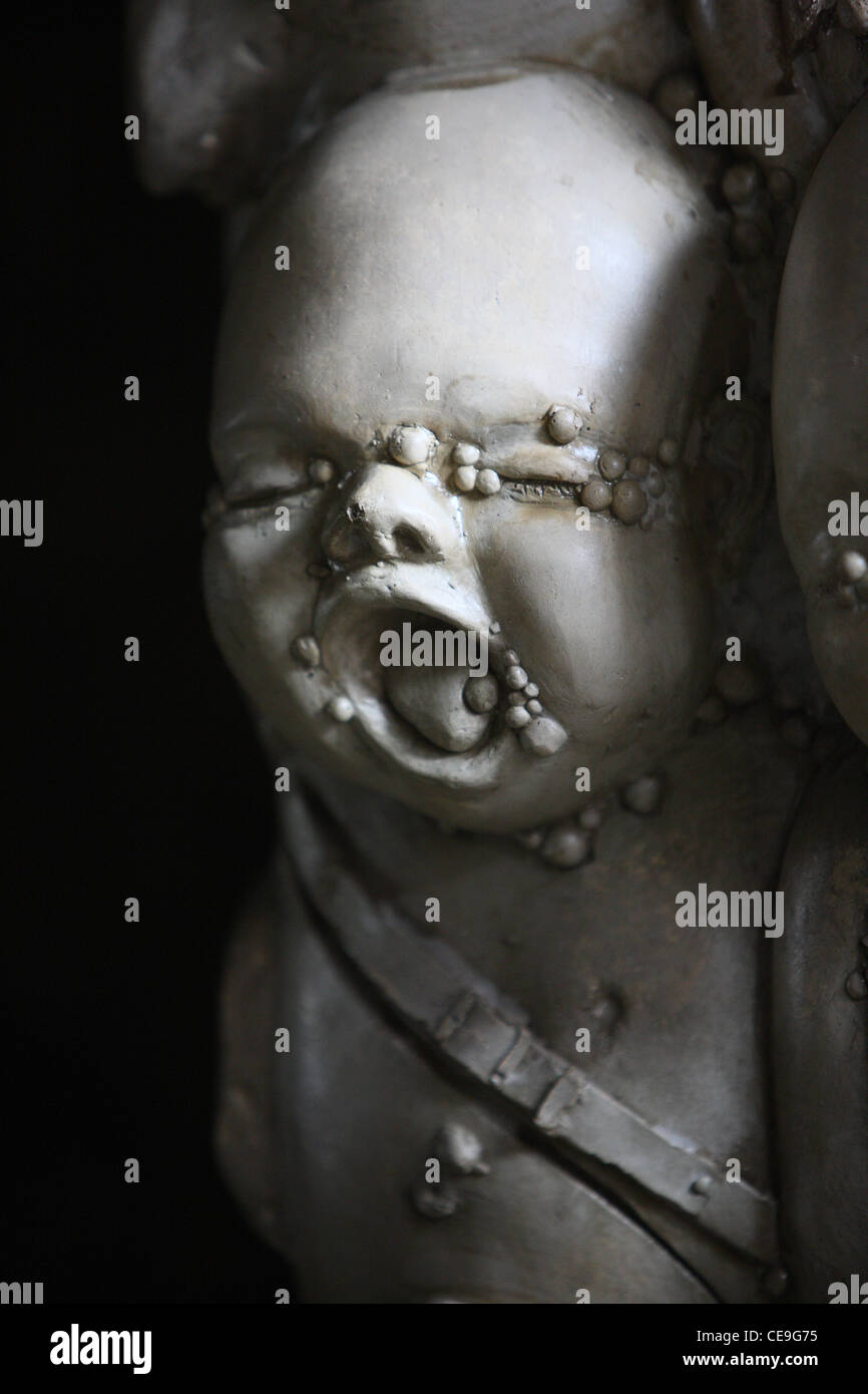 Child's face in 'Alien Cafe' by H.R. Giger in Gruyères, Switzerland. Stock Photo