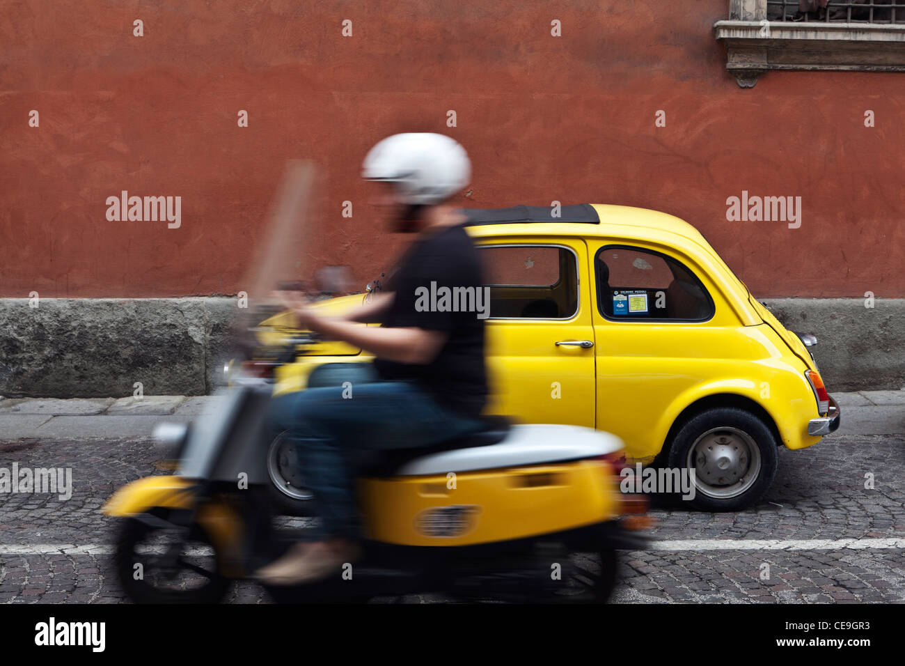 Yellow Scooter and Fiat 500 Bologna Emilia-Romagna Italy Stock Photo