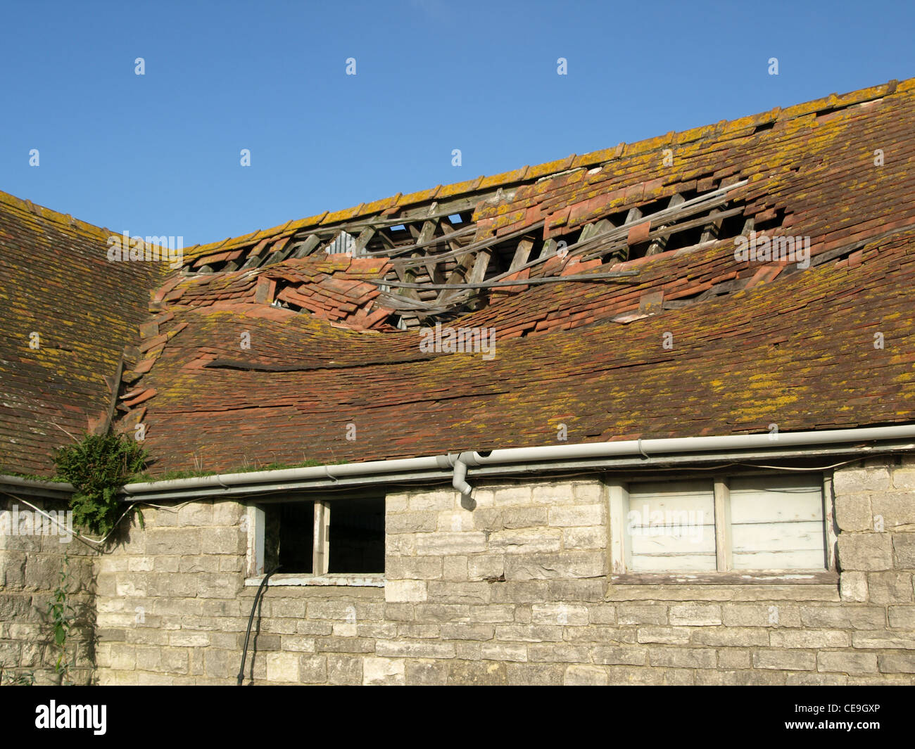 Barn Roof deteriorating Needs Repair Stock Photo Alamy