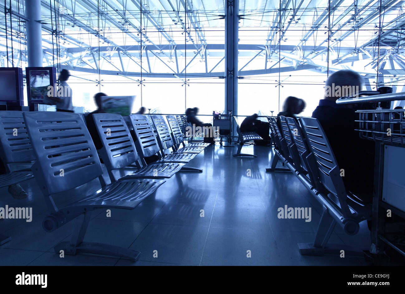 Waiting room passengers in airport hi-res stock photography and images ...
