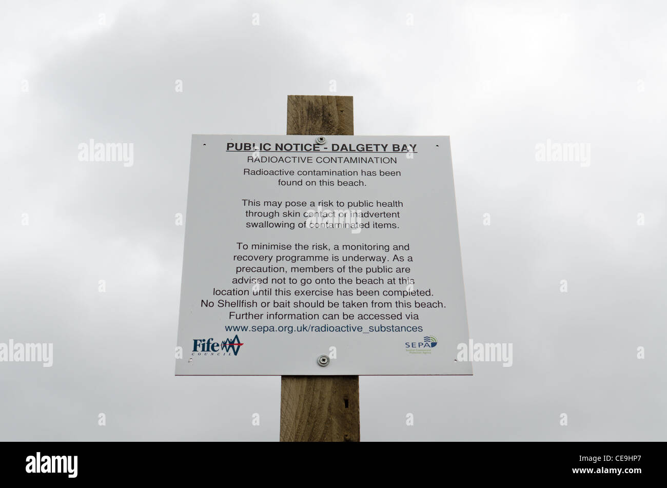 Public notice warning of radioactive contaminants found on Dalgety Bay beach. Stock Photo