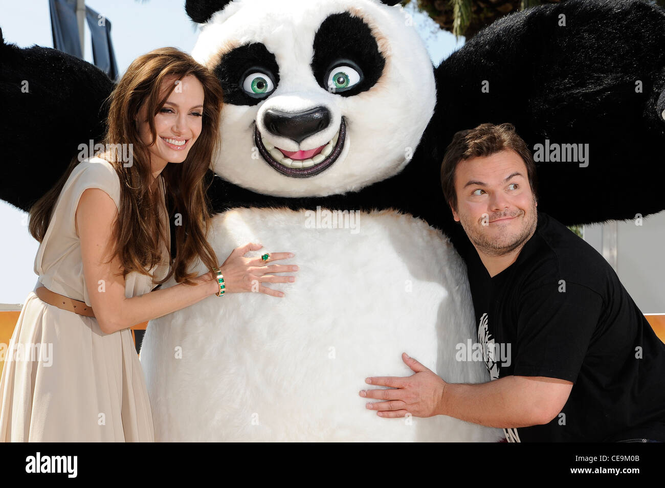 Jack Black and Angelina Jolie during a photo call for Kung Fu Panda 2, at the 64th international film festival, in Cannes. Stock Photo