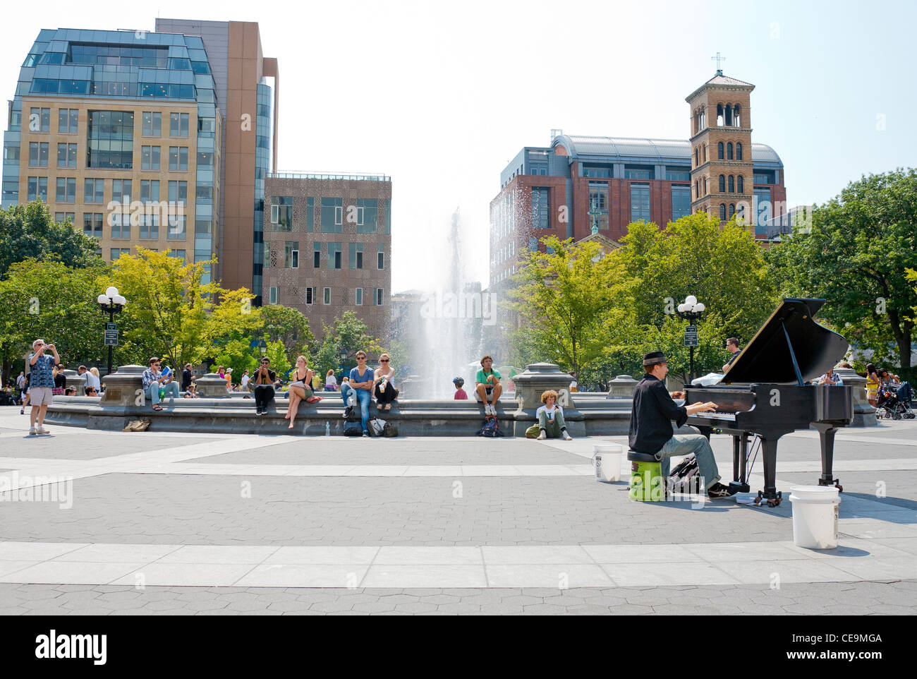 A piano player playing his piano in Washington Square Park in Manhattan, New York City. Stock Photo