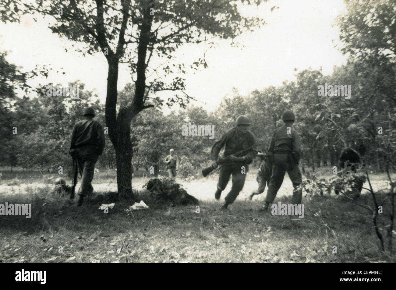 solider running with M1 Garand at Ft. Knox during the 1940s or 1950s US army training Stock Photo