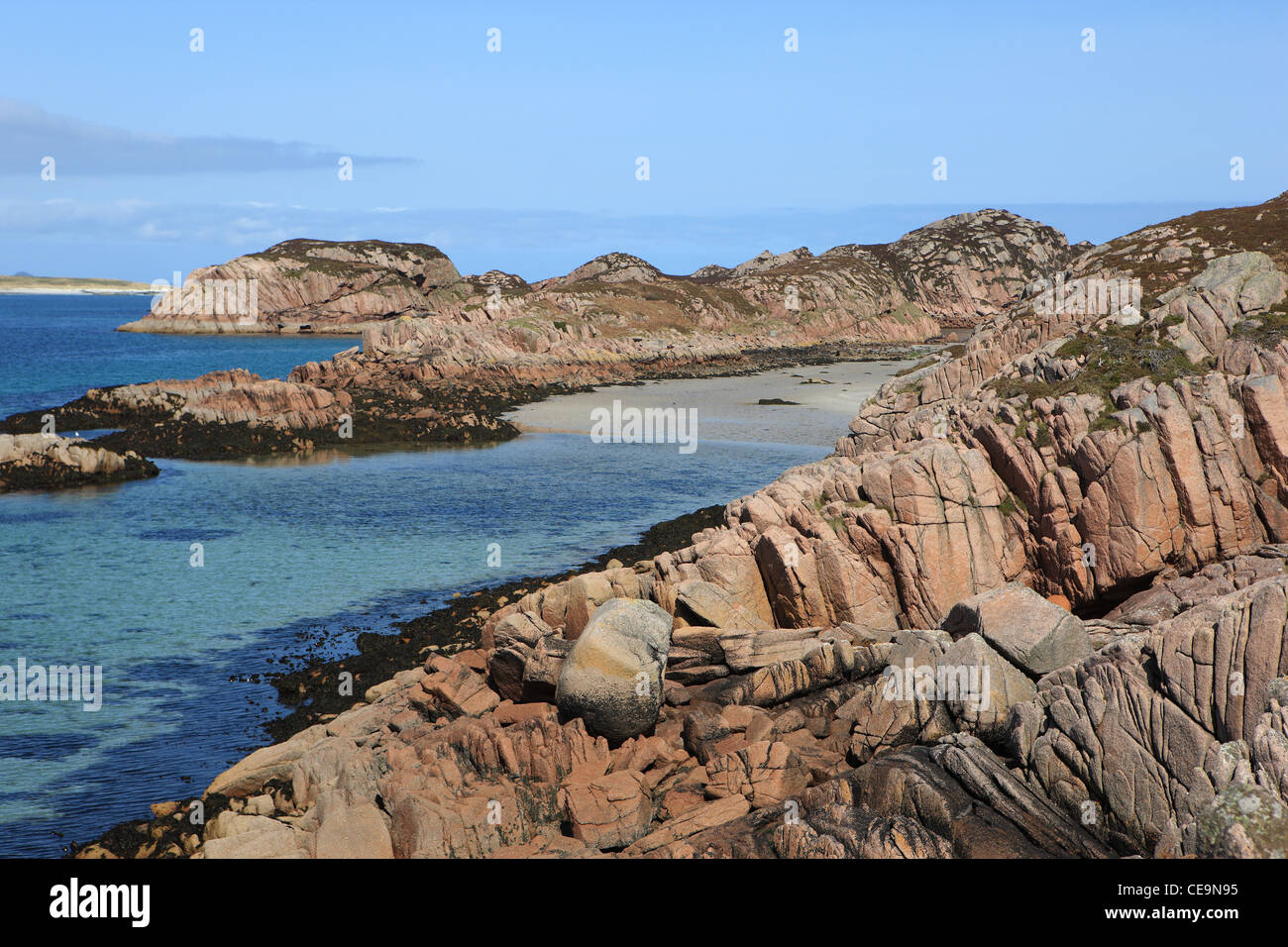 Pink granite and sandy beaches of the Inner Hebrides of Scotland Stock Photo