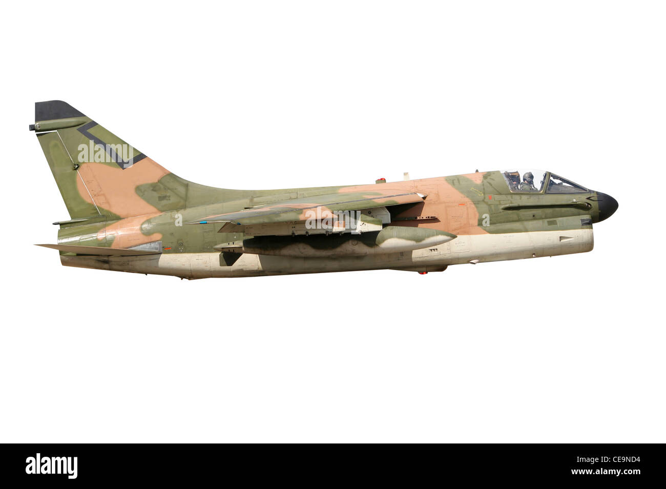 Vietnam era camouflaged A-7 Corsair fighter jet isolated Stock Photo