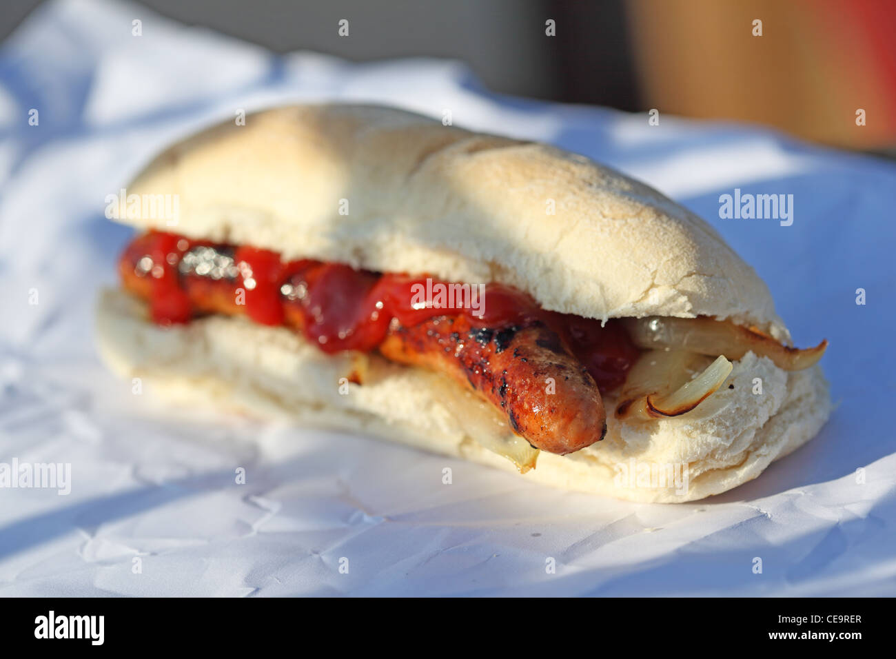 sandwich sausage barm eating on the street Stock Photo