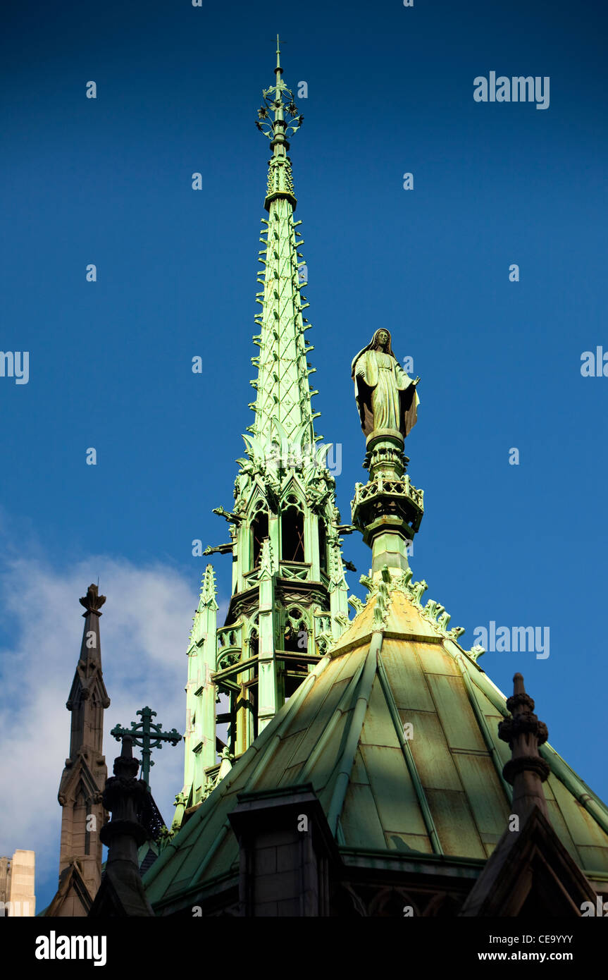 Copper Christ statue on top of St Patrick's Cathedral, New York, USA Stock Photo