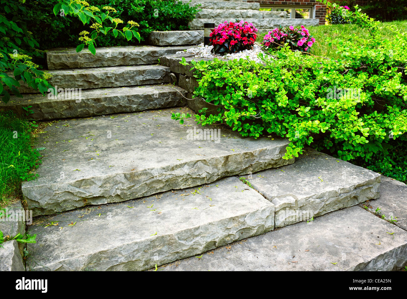 Natural stone stairs landscaping in home garden Stock Photo