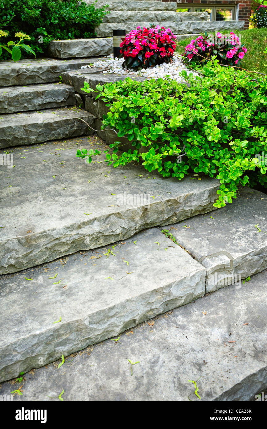 Natural stone stairs landscaping in home garden Stock Photo
