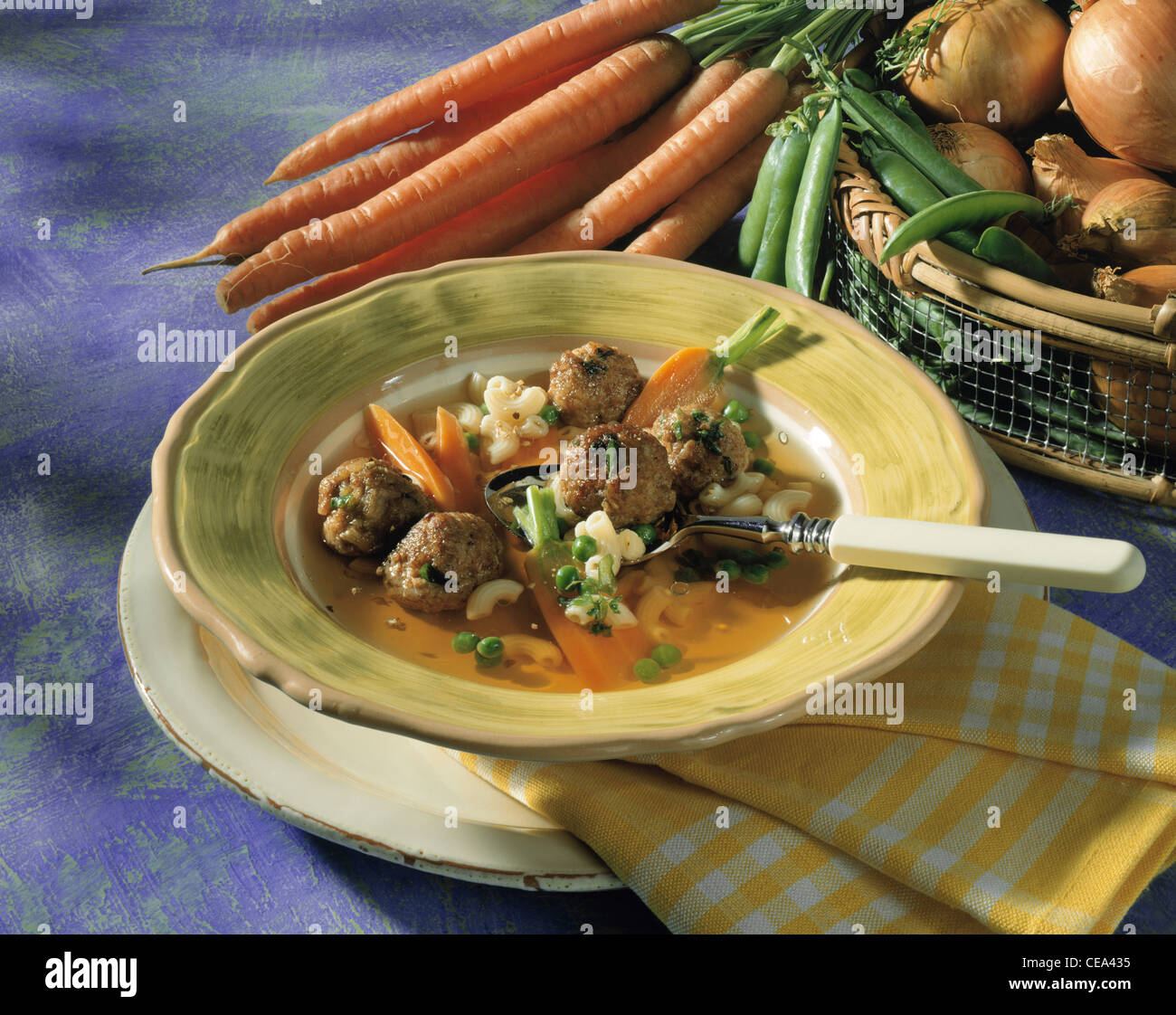 Carrot - pea soup with noodles and  majoram - minced meat balls Stock Photo