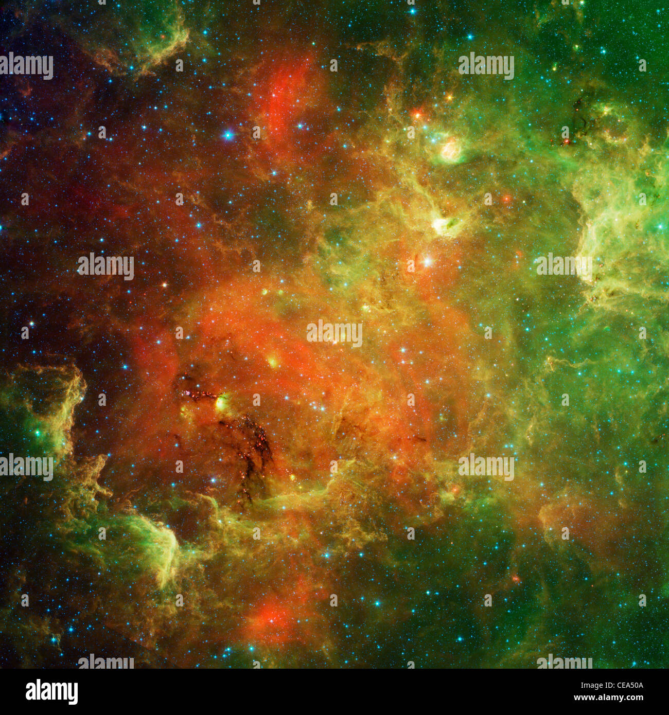 Swirling Landscape of Stars This swirling landscape of stars is known as the North America Nebula. In visible light, the region Stock Photo