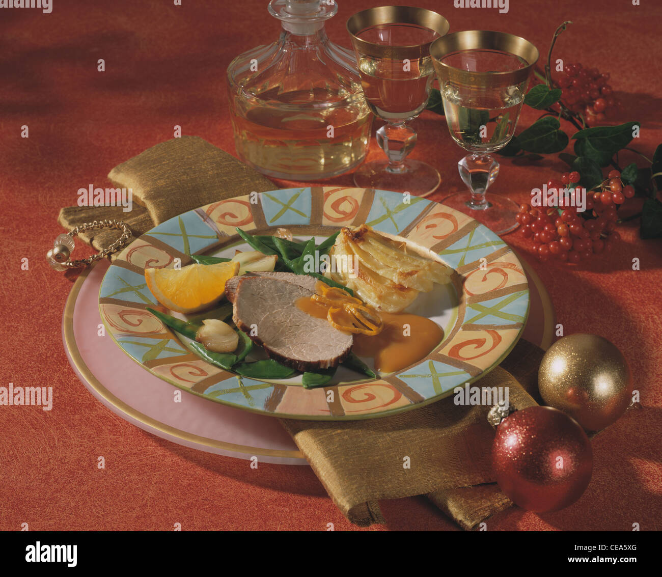 Pork joint with orange sauce Stock Photo Alamy