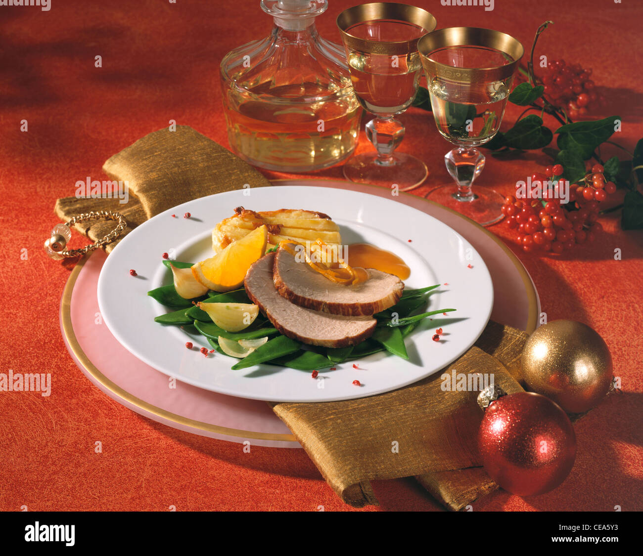 Pork joint with orange sauce Stock Photo Alamy